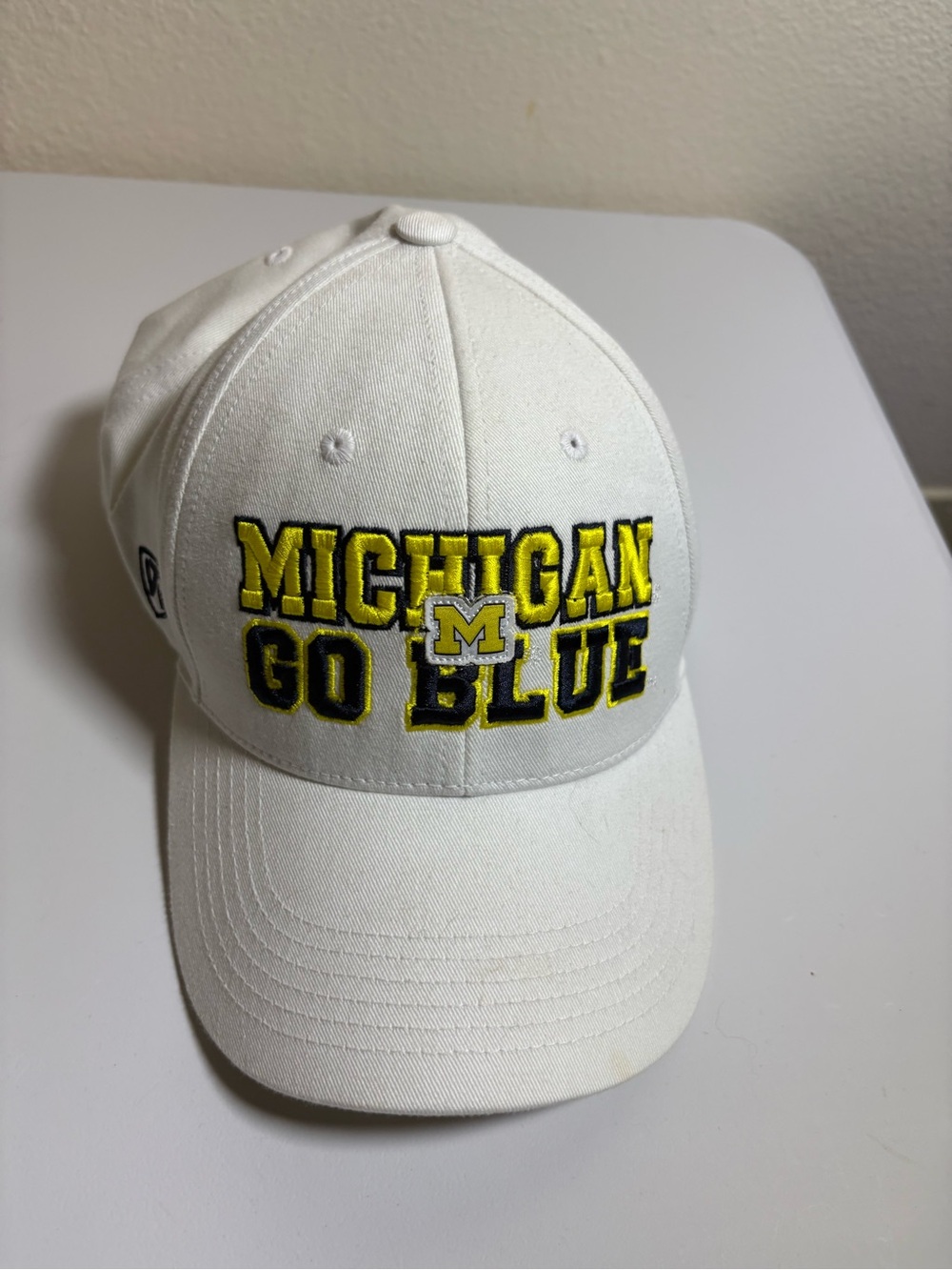 Top of the World White Hat with Blue Logo
